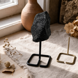 Mineral Specimen on Metal Stand - Black Tourmaline — styled in a warm, naturally lit interior