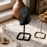 Mineral Specimen on Metal Stand - Black Tourmaline — styled in a warm, naturally lit interior