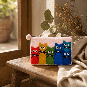 Natural Felt Zipper Pouches - Curious Cat Group — styled in a warm, naturally lit interior