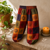 Nomad Sari - Mushroom Pants - Block Print Designs - Orange Tones S/M — styled in a warm, naturally lit interior