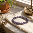 Petite Power Bracelet (17cmx6mm) - Amethyst — styled in a warm, naturally lit interior