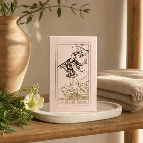 Pink Box Ruby Foil Tarot Card Gift Box Set - with booklet — styled in a warm, naturally lit interior