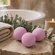 Set of 3 Bubblegum Bath Bombs — styled in a warm, naturally lit interior