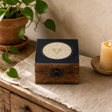 Small Enamelled Box - Aries — styled in a warm, naturally lit interior