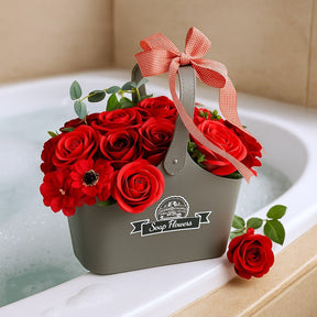 Gray basket with red roses and a red ribbon on a bathtub