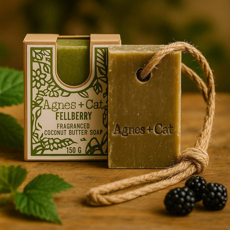 Agnes + Cat Fellberry soap with packaging on a wooden surface
