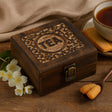 Wooden tea box with floral and tea cup background