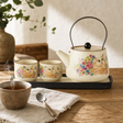 Travel Teapot Set & Two Cups - Cat Lover — styled in a warm, naturally lit interior